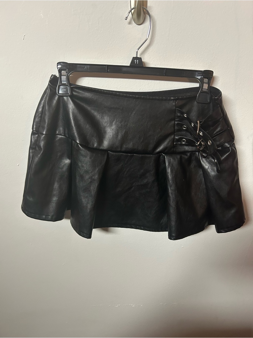PrettyLittleThing Black Faux Leather Flared Mini Skirt with Buckle Detail